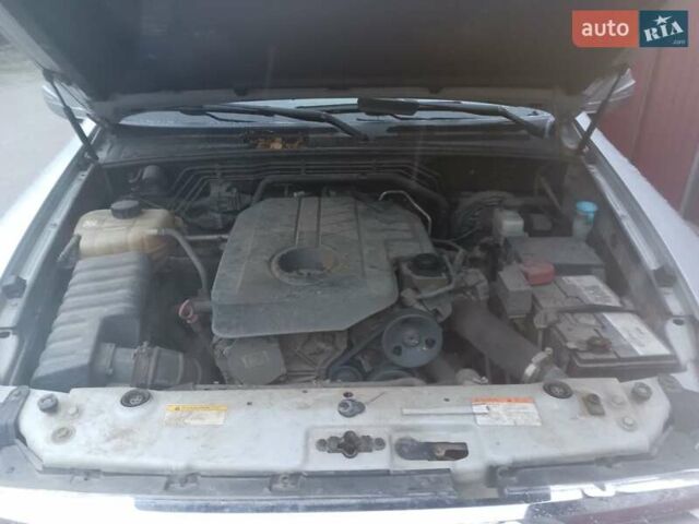 Сірий Cанг Йонг Rexton, об'ємом двигуна 2 л та пробігом 189 тис. км за 15000 $, фото 7 на Automoto.ua