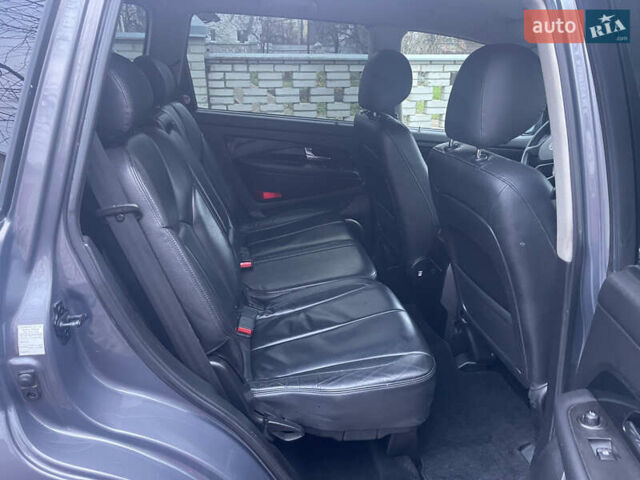 Сірий Cанг Йонг Rexton, об'ємом двигуна 2.2 л та пробігом 200 тис. км за 13900 $, фото 15 на Automoto.ua