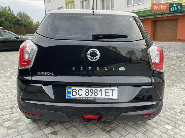 Чорний Cанг Йонг Тіволі, об'ємом двигуна 1.6 л та пробігом 118 тис. км за 10999 $, фото 20 на Automoto.ua