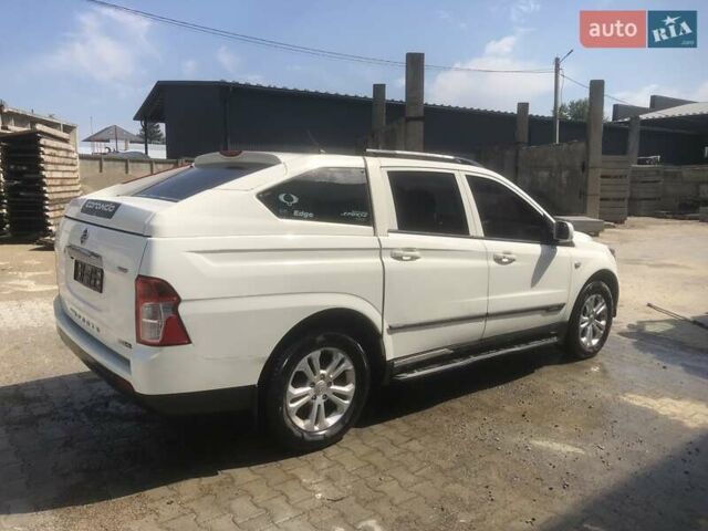 Білий Cанг Йонг Korando Sports, об'ємом двигуна 2 л та пробігом 194 тис. км за 15077 $, фото 6 на Automoto.ua