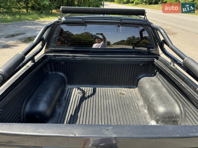 Черный Cанг Йонг Korando Sports, объемом двигателя 2 л и пробегом 265 тыс. км за 15500 $, фото 10 на Automoto.ua