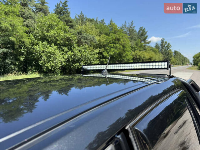 Черный Cанг Йонг Korando Sports, объемом двигателя 2 л и пробегом 265 тыс. км за 15500 $, фото 13 на Automoto.ua