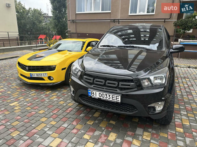 Черный Cанг Йонг Korando Sports, объемом двигателя 2 л и пробегом 265 тыс. км за 15500 $, фото 4 на Automoto.ua