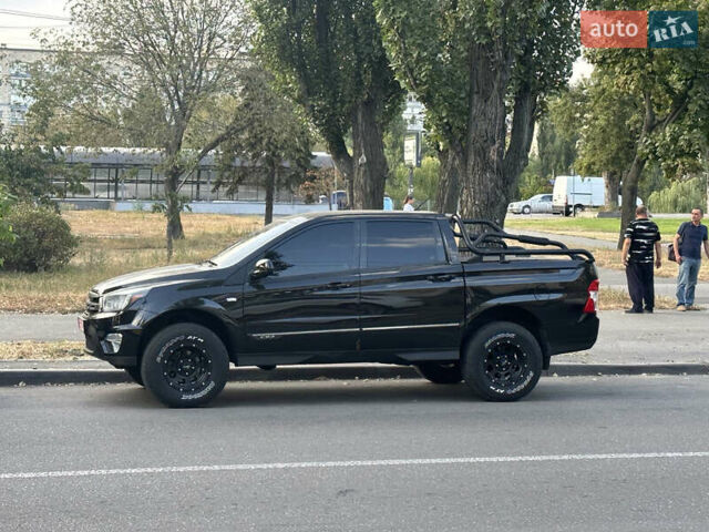 Черный Cанг Йонг Korando Sports, объемом двигателя 2 л и пробегом 265 тыс. км за 15500 $, фото 5 на Automoto.ua