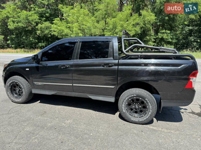 Черный Cанг Йонг Korando Sports, объемом двигателя 2 л и пробегом 265 тыс. км за 15500 $, фото 11 на Automoto.ua