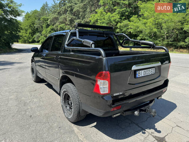 Черный Cанг Йонг Korando Sports, объемом двигателя 2 л и пробегом 265 тыс. км за 15500 $, фото 15 на Automoto.ua