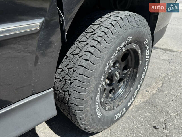 Черный Cанг Йонг Korando Sports, объемом двигателя 2 л и пробегом 265 тыс. км за 15500 $, фото 19 на Automoto.ua