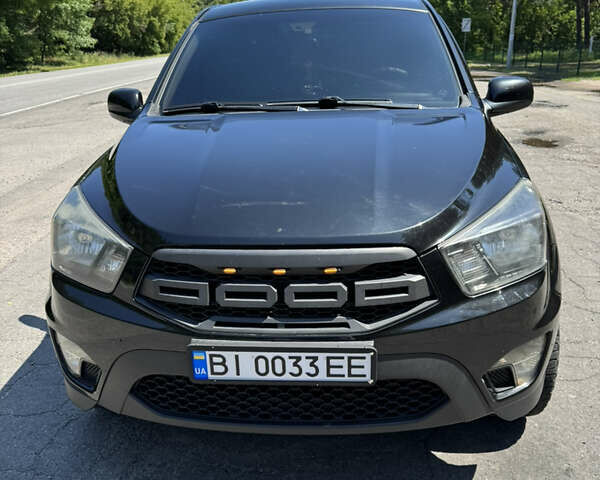 Черный Cанг Йонг Korando Sports, объемом двигателя 2 л и пробегом 265 тыс. км за 15500 $, фото 14 на Automoto.ua