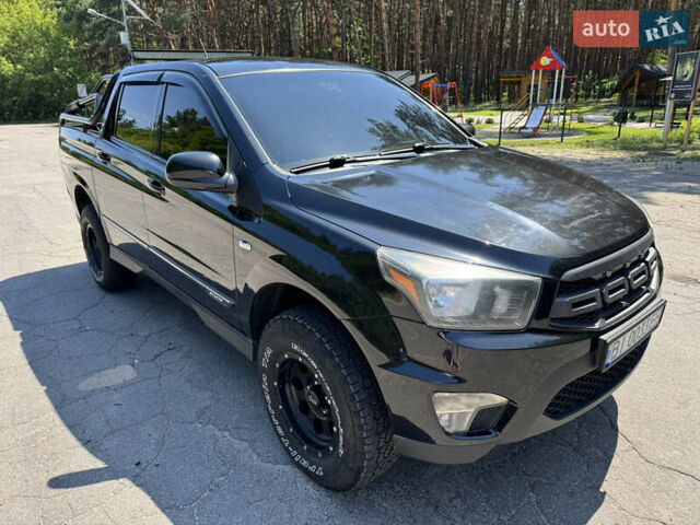 Черный Cанг Йонг Korando Sports, объемом двигателя 2 л и пробегом 265 тыс. км за 15500 $, фото 8 на Automoto.ua