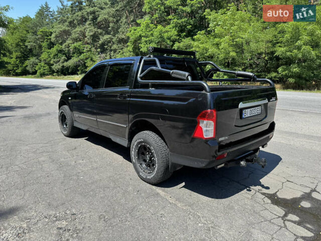 Черный Cанг Йонг Korando Sports, объемом двигателя 2 л и пробегом 265 тыс. км за 15500 $, фото 12 на Automoto.ua