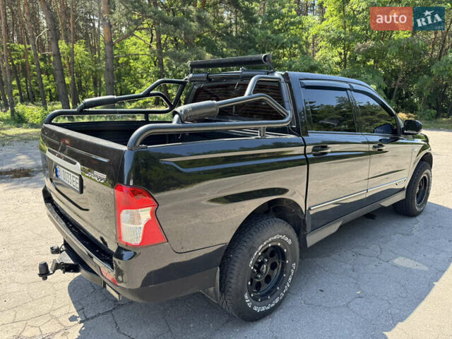 Черный Cанг Йонг Korando Sports, объемом двигателя 2 л и пробегом 265 тыс. км за 15500 $, фото 16 на Automoto.ua