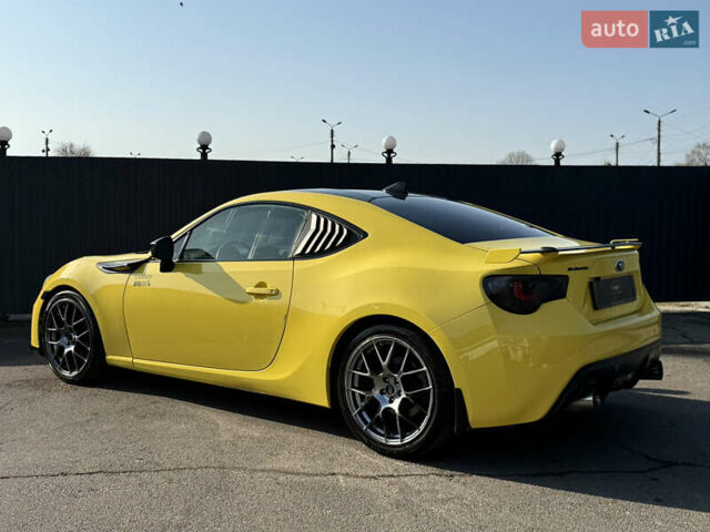 Желтый Субару БРЗ, объемом двигателя 2 л и пробегом 61 тыс. км за 11000 $, фото 3 на Automoto.ua