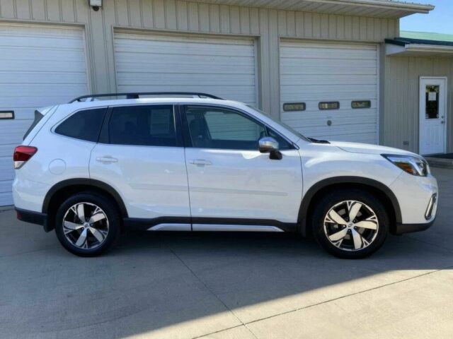 Белый Субару Форестер, объемом двигателя 2.5 л и пробегом 27 тыс. км за 6500 $, фото 4 на Automoto.ua