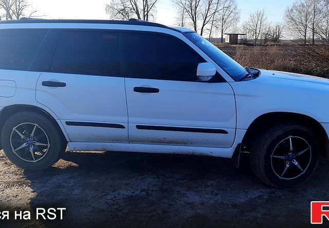 Белый Субару Форестер, объемом двигателя 2 л и пробегом 214 тыс. км за 5250 $, фото 2 на Automoto.ua