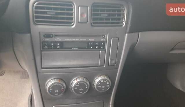 Белый Субару Форестер, объемом двигателя 1.99 л и пробегом 214 тыс. км за 5250 $, фото 7 на Automoto.ua