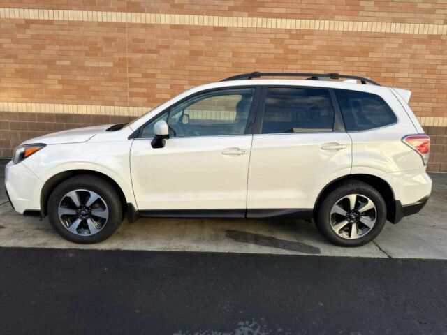 Белый Субару Форестер, объемом двигателя 2.5 л и пробегом 51 тыс. км за 12000 $, фото 3 на Automoto.ua