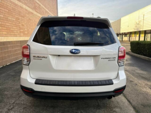 Белый Субару Форестер, объемом двигателя 2.5 л и пробегом 51 тыс. км за 12000 $, фото 4 на Automoto.ua
