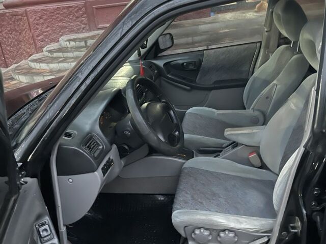 Чорний Субару Forester, об'ємом двигуна 2 л та пробігом 350 тис. км за 2950 $, фото 9 на Automoto.ua
