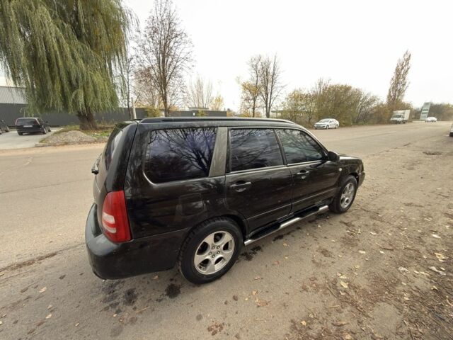 Черный Субару Форестер, объемом двигателя 2 л и пробегом 376 тыс. км за 3900 $, фото 3 на Automoto.ua