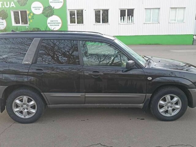 Черный Субару Форестер, объемом двигателя 2 л и пробегом 251 тыс. км за 5100 $, фото 8 на Automoto.ua