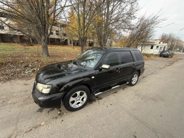 Черный Субару Форестер, объемом двигателя 2 л и пробегом 376 тыс. км за 3900 $, фото 4 на Automoto.ua