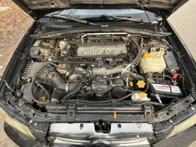 Черный Субару Форестер, объемом двигателя 2 л и пробегом 376 тыс. км за 3900 $, фото 1 на Automoto.ua