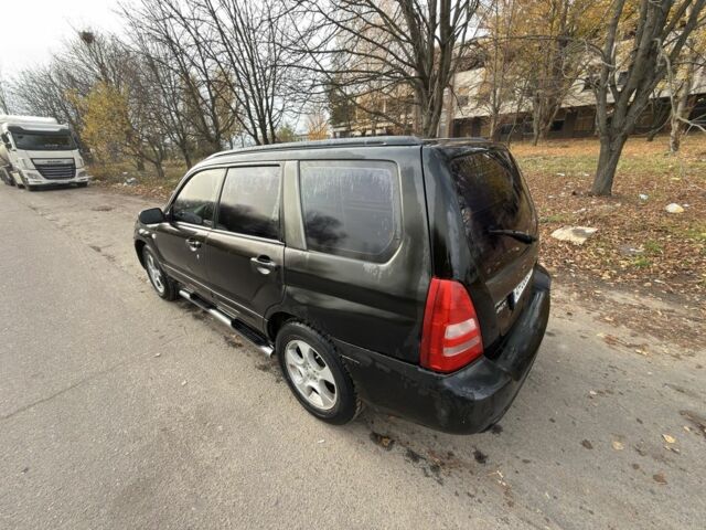 Черный Субару Форестер, объемом двигателя 2 л и пробегом 376 тыс. км за 3900 $, фото 5 на Automoto.ua