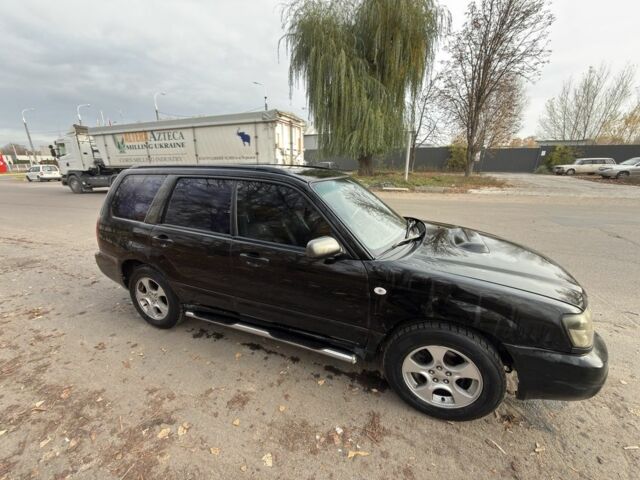 Черный Субару Форестер, объемом двигателя 2 л и пробегом 376 тыс. км за 3900 $, фото 2 на Automoto.ua