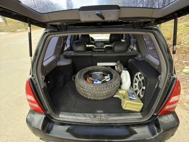 Черный Субару Форестер, объемом двигателя 2 л и пробегом 376 тыс. км за 3900 $, фото 7 на Automoto.ua