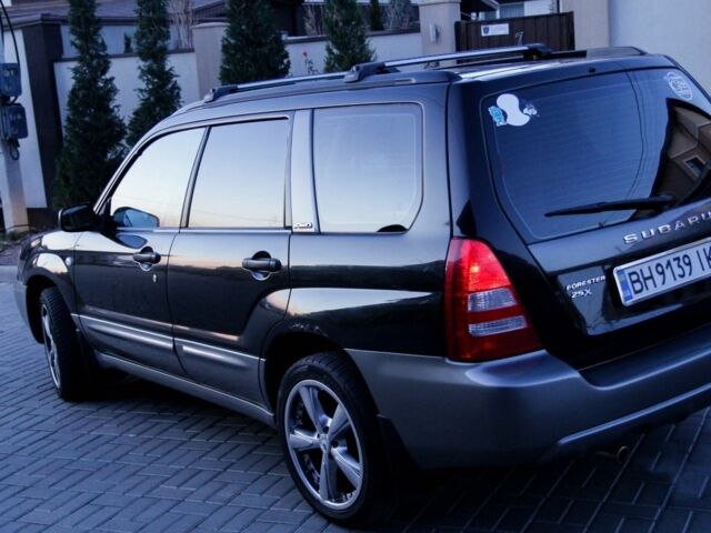 Черный Субару Форестер, объемом двигателя 2.5 л и пробегом 250 тыс. км за 5852 $, фото 3 на Automoto.ua