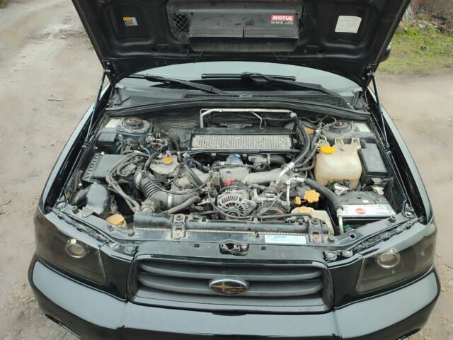 Черный Субару Форестер, объемом двигателя 2 л и пробегом 420 тыс. км за 5200 $, фото 6 на Automoto.ua