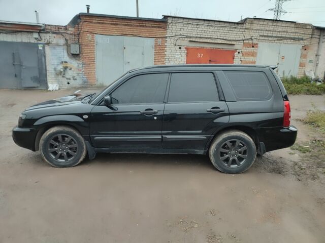 Черный Субару Форестер, объемом двигателя 2 л и пробегом 420 тыс. км за 5200 $, фото 4 на Automoto.ua