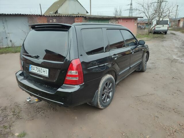 Черный Субару Форестер, объемом двигателя 2 л и пробегом 420 тыс. км за 5200 $, фото 5 на Automoto.ua