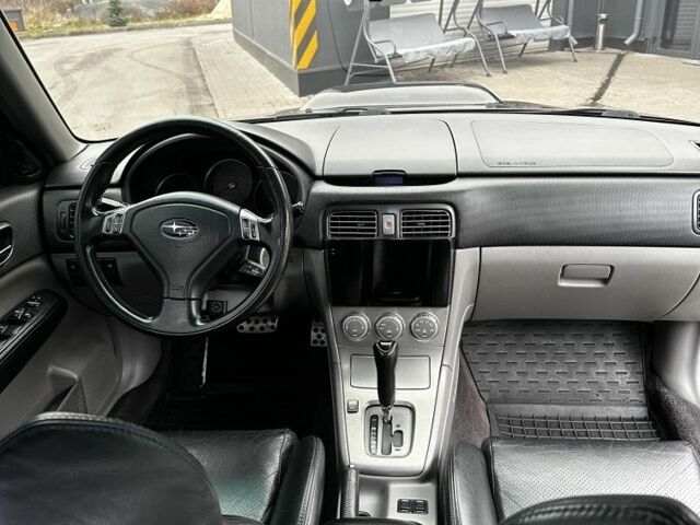 Черный Субару Форестер, объемом двигателя 2.5 л и пробегом 302 тыс. км за 8500 $, фото 7 на Automoto.ua