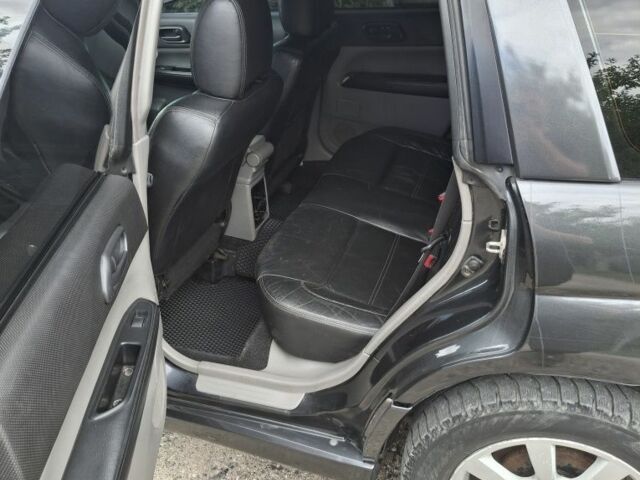 Черный Субару Форестер, объемом двигателя 2 л и пробегом 324 тыс. км за 5500 $, фото 8 на Automoto.ua