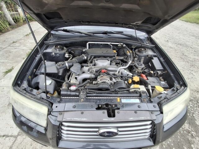 Черный Субару Форестер, объемом двигателя 2 л и пробегом 324 тыс. км за 5500 $, фото 16 на Automoto.ua