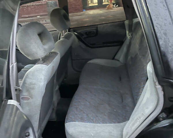 Черный Субару Форестер, объемом двигателя 1.99 л и пробегом 360 тыс. км за 2950 $, фото 10 на Automoto.ua