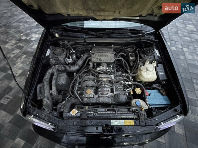 Черный Субару Форестер, объемом двигателя 1.99 л и пробегом 360 тыс. км за 2950 $, фото 14 на Automoto.ua