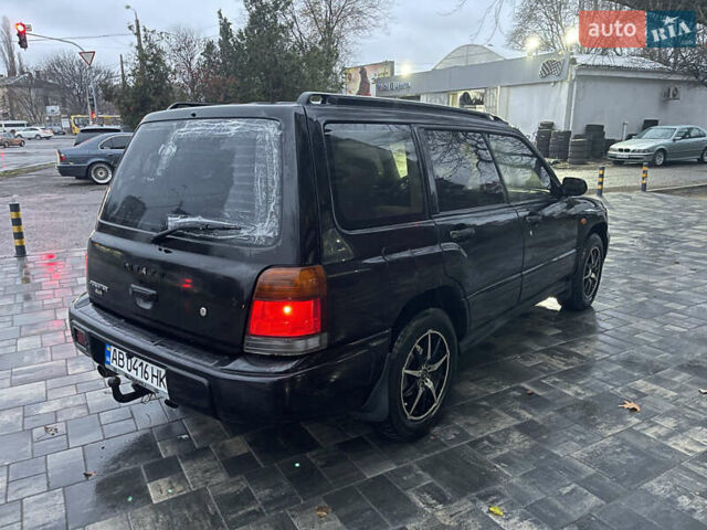 Черный Субару Форестер, объемом двигателя 1.99 л и пробегом 360 тыс. км за 2950 $, фото 4 на Automoto.ua