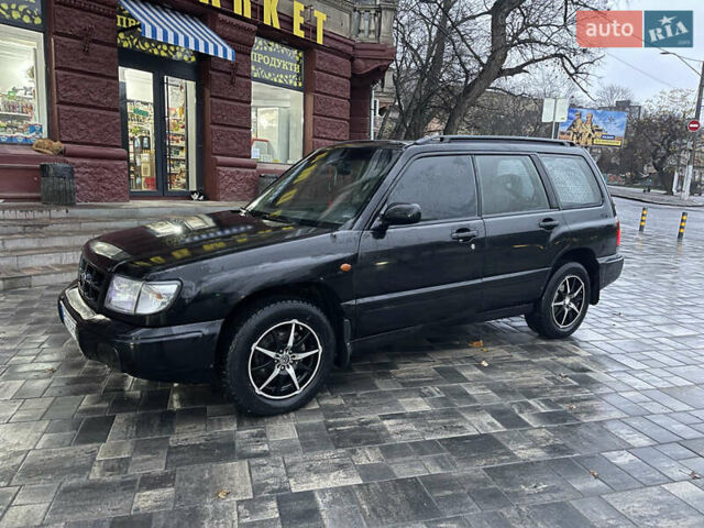 Черный Субару Форестер, объемом двигателя 1.99 л и пробегом 360 тыс. км за 2950 $, фото 1 на Automoto.ua