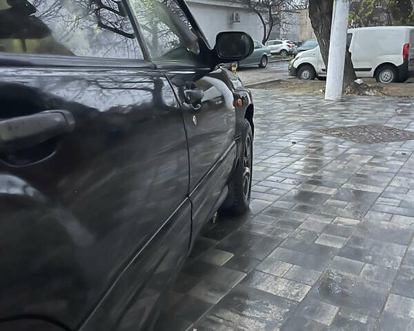 Черный Субару Форестер, объемом двигателя 1.99 л и пробегом 360 тыс. км за 2950 $, фото 7 на Automoto.ua