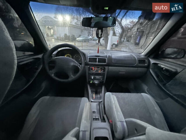 Черный Субару Форестер, объемом двигателя 1.99 л и пробегом 360 тыс. км за 2950 $, фото 13 на Automoto.ua