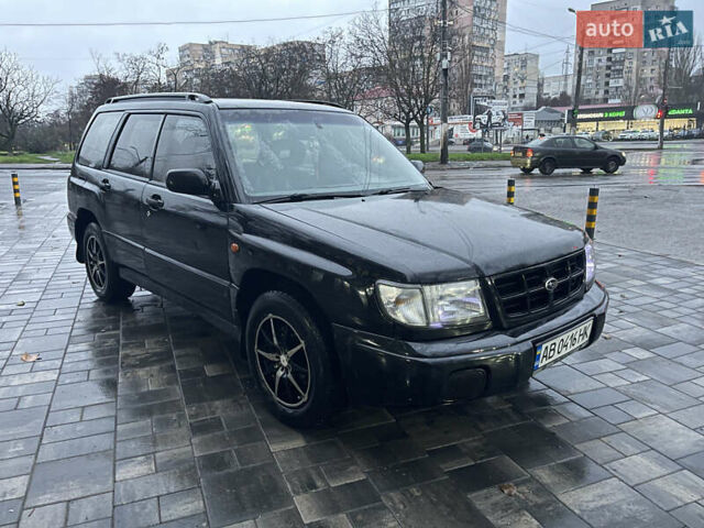 Черный Субару Форестер, объемом двигателя 1.99 л и пробегом 360 тыс. км за 2950 $, фото 5 на Automoto.ua