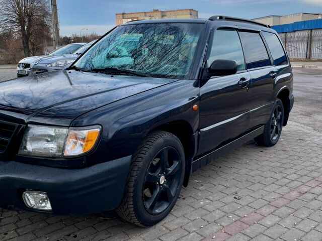 Чорний Субару Forester, об'ємом двигуна 2 л та пробігом 300 тис. км за 2599 $, фото 6 на Automoto.ua