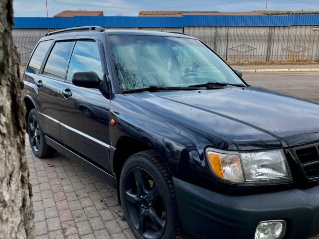 Чорний Субару Forester, об'ємом двигуна 2 л та пробігом 300 тис. км за 2599 $, фото 4 на Automoto.ua