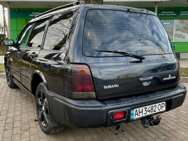 Чорний Субару Forester, об'ємом двигуна 2 л та пробігом 300 тис. км за 2599 $, фото 3 на Automoto.ua