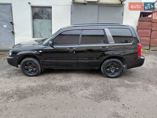 Чорний Субару Forester, об'ємом двигуна 2 л та пробігом 369 тис. км за 5350 $, фото 4 на Automoto.ua