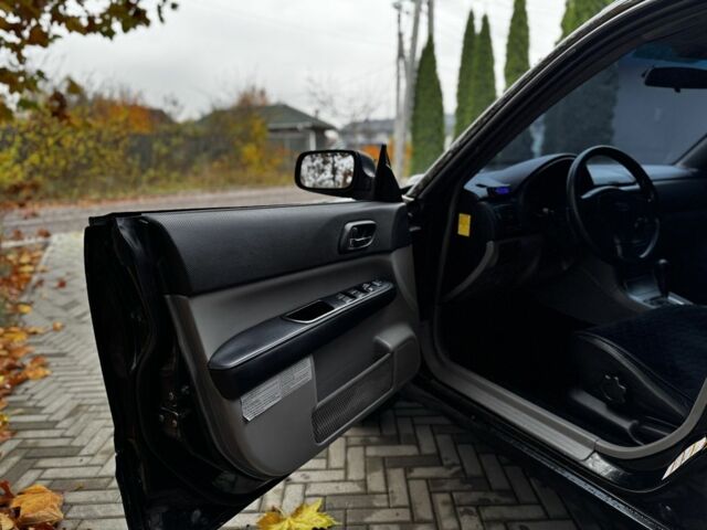 Черный Субару Форестер, объемом двигателя 2 л и пробегом 225 тыс. км за 4600 $, фото 11 на Automoto.ua