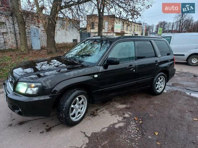 Черный Субару Форестер, объемом двигателя 1.99 л и пробегом 295 тыс. км за 5500 $, фото 1 на Automoto.ua