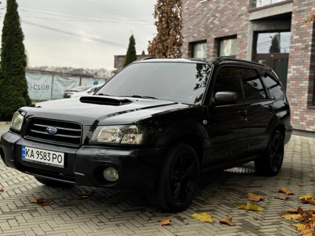 Черный Субару Форестер, объемом двигателя 2 л и пробегом 225 тыс. км за 4600 $, фото 2 на Automoto.ua